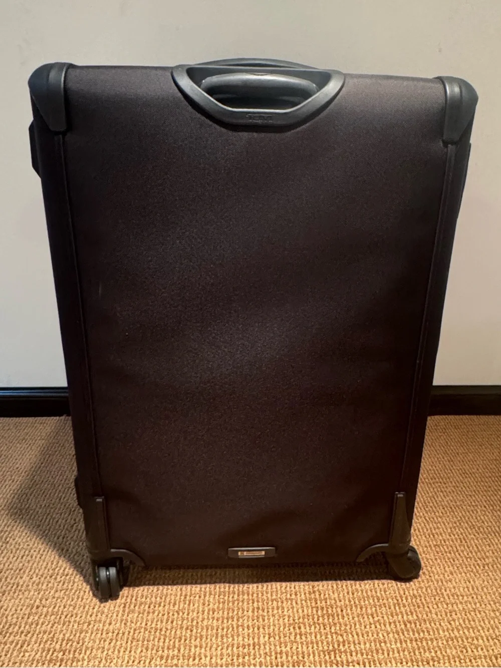 Tumi Black Softside Spinner check luggage with Front Pocket